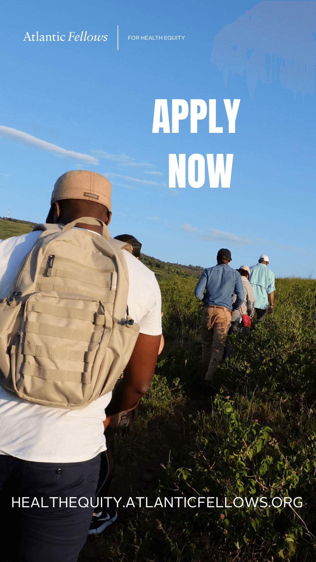 Group of people walking in a field - apply now