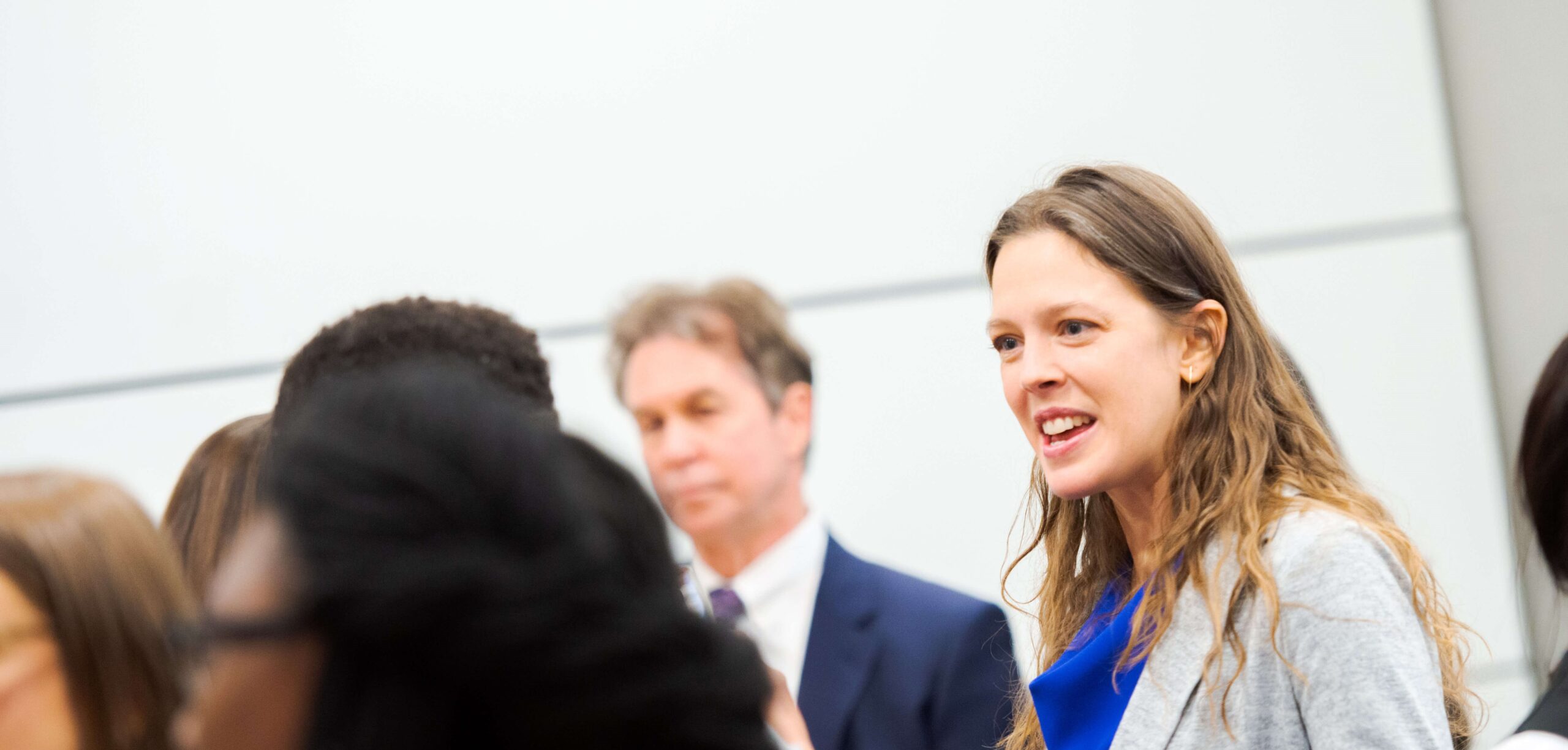 Lindsey Pollaczek speaking at a reception