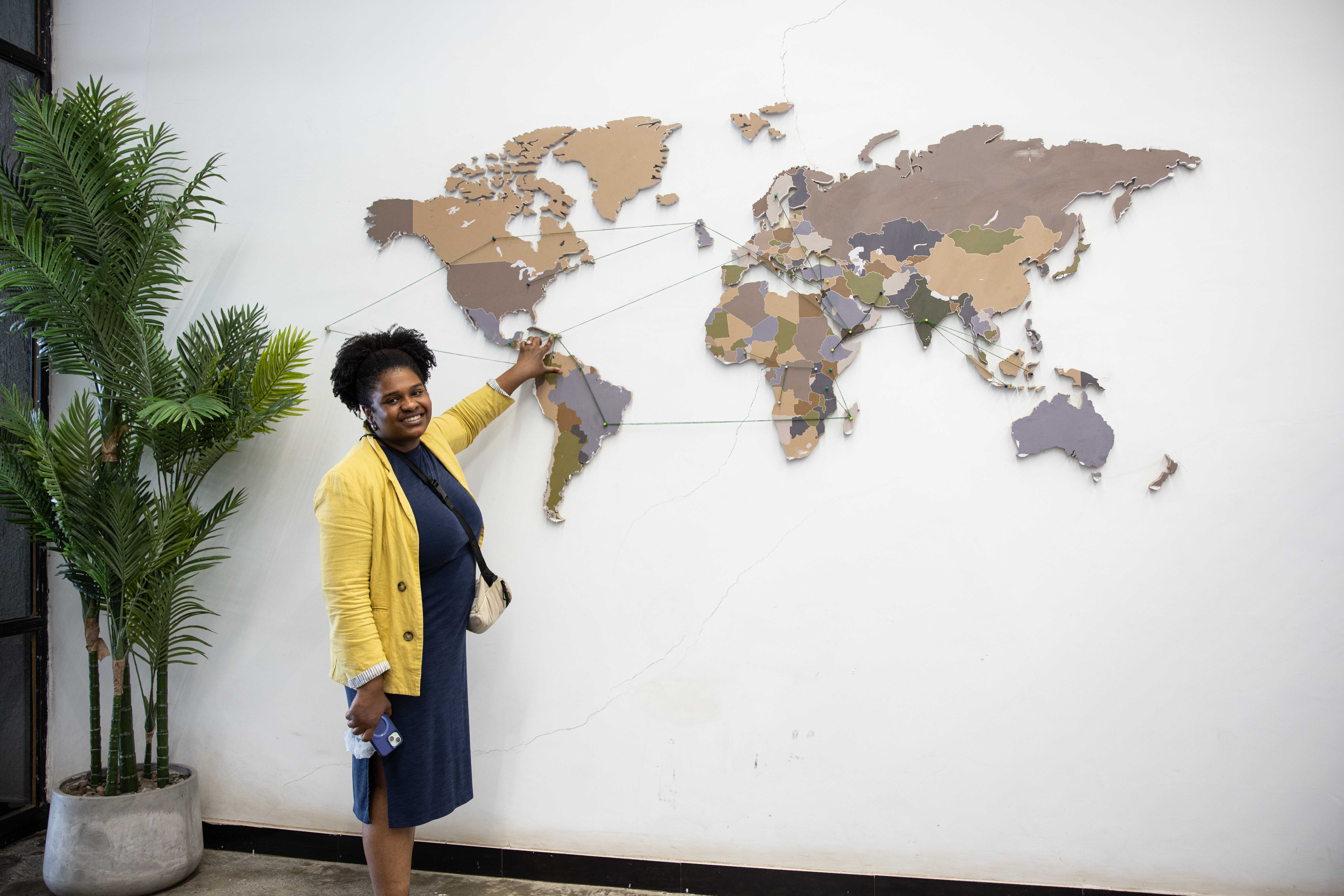 Woman pointing to a map