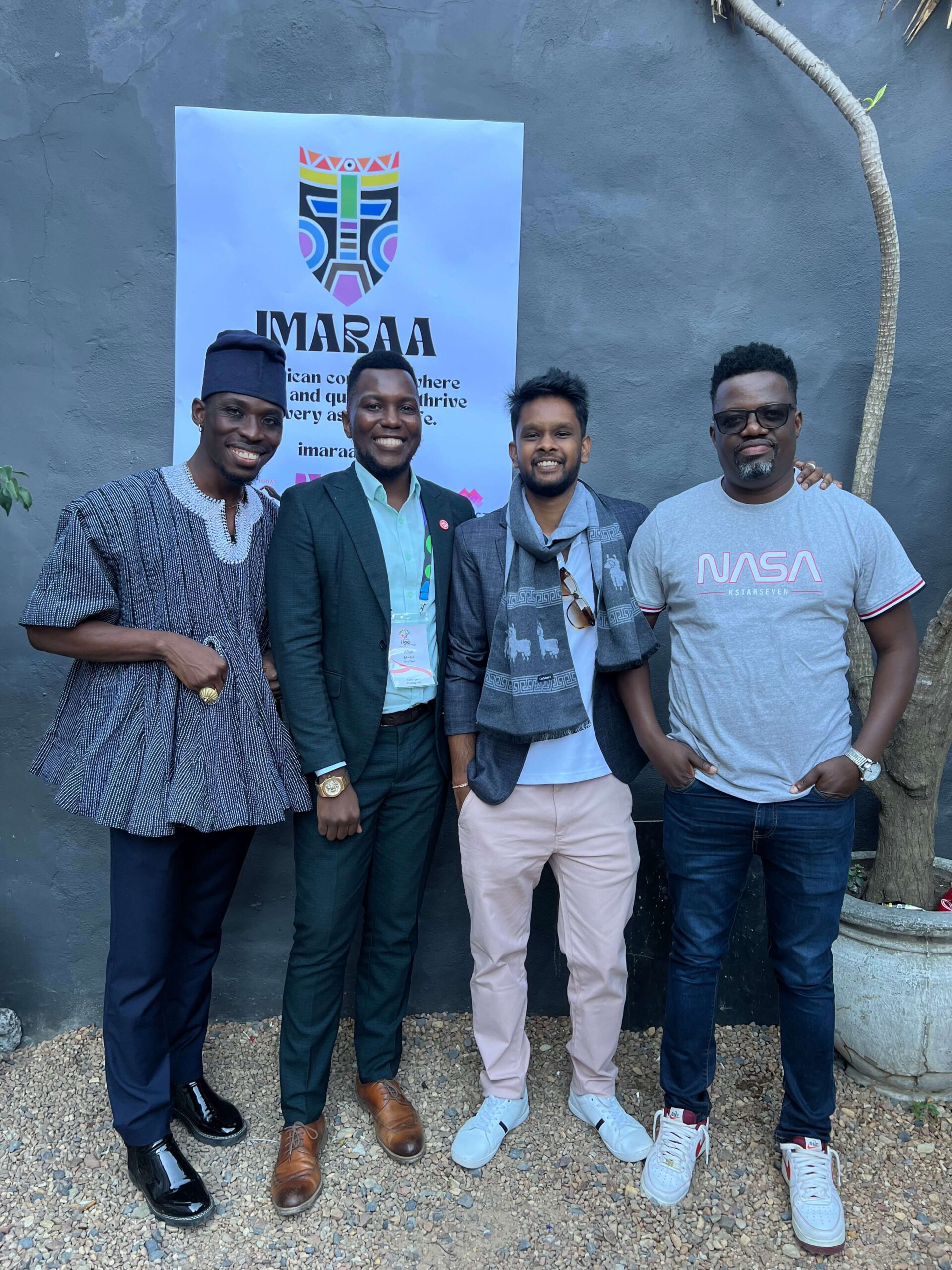 Four Black men posing for a picture.
