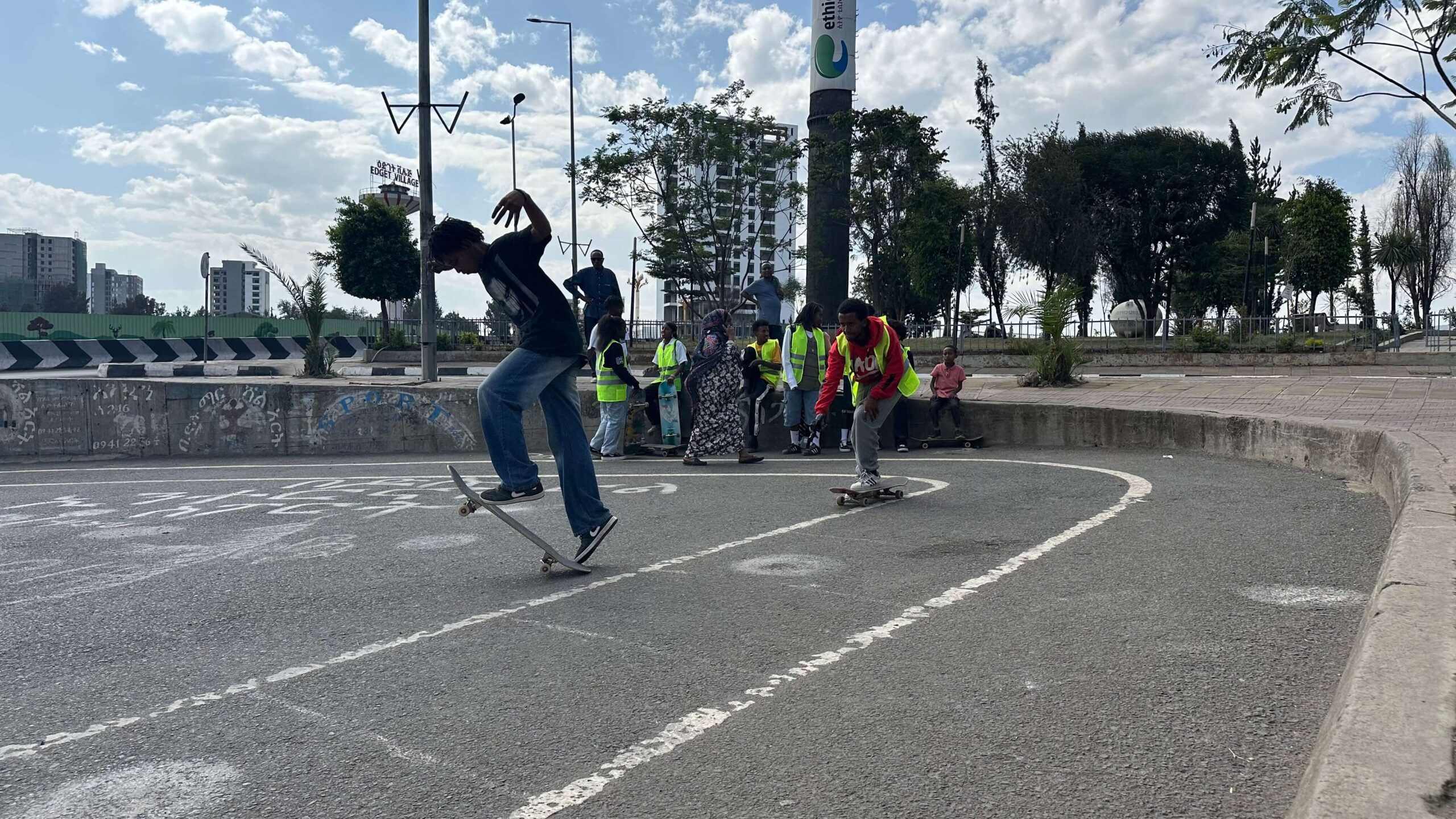 kids skateboarding on a blacktop