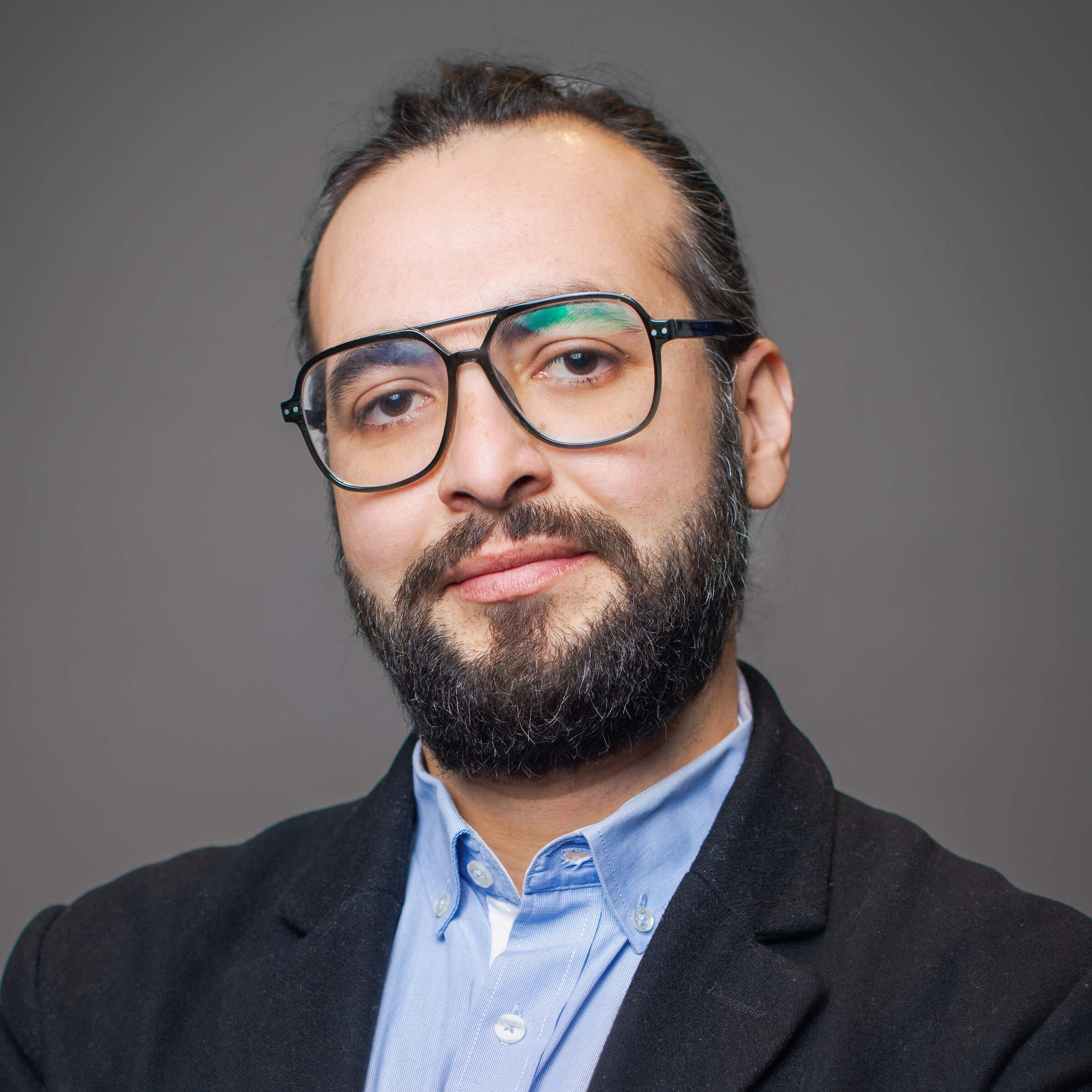 Man posing for a headshot.