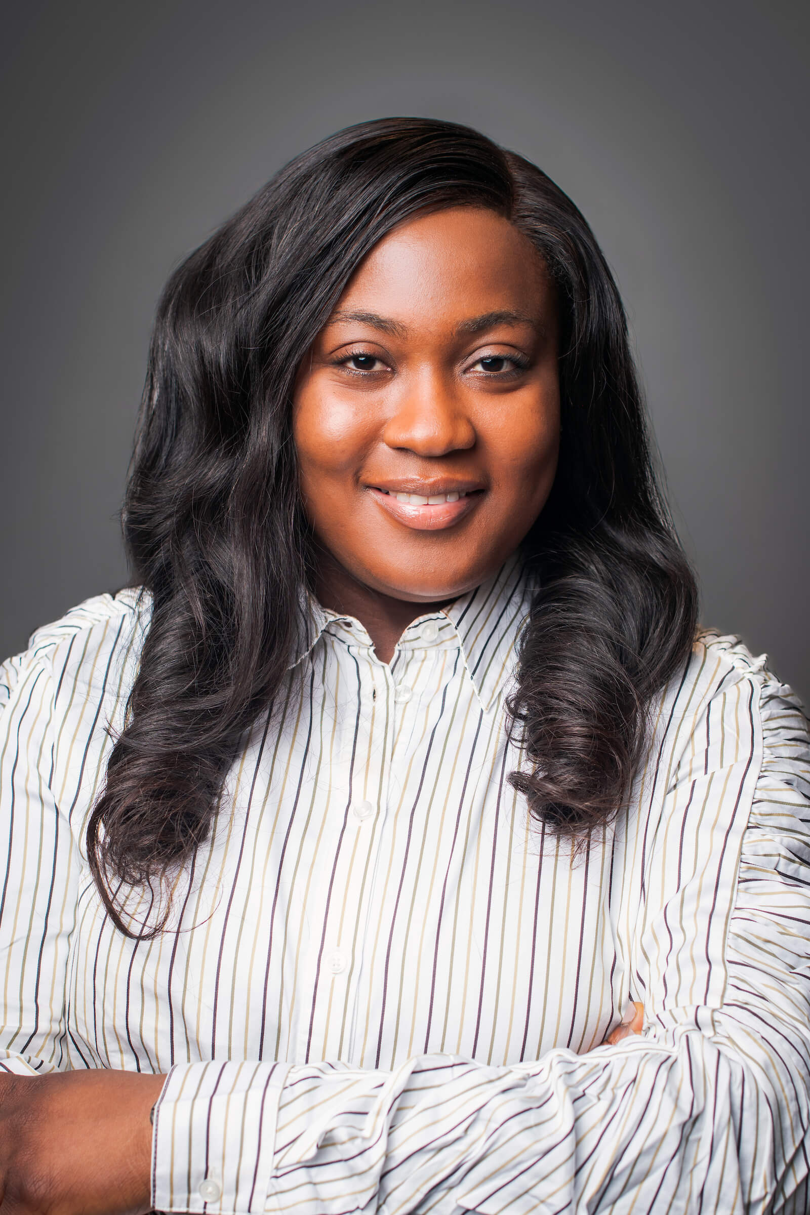 Professional headshot of a woman.