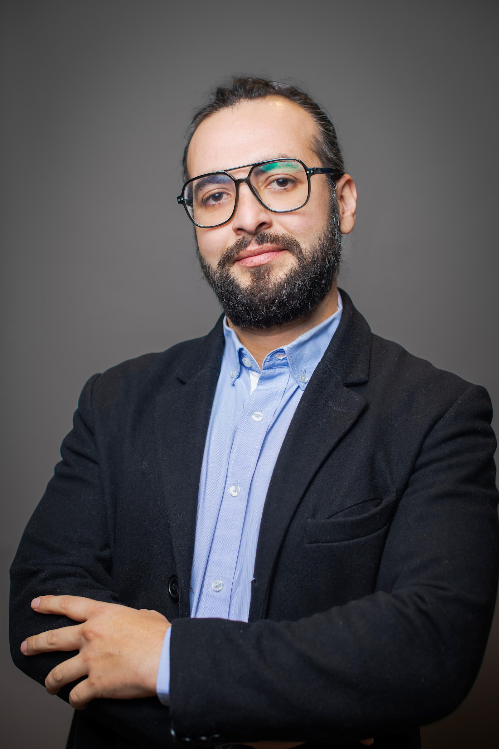 Professional headshot of a man.