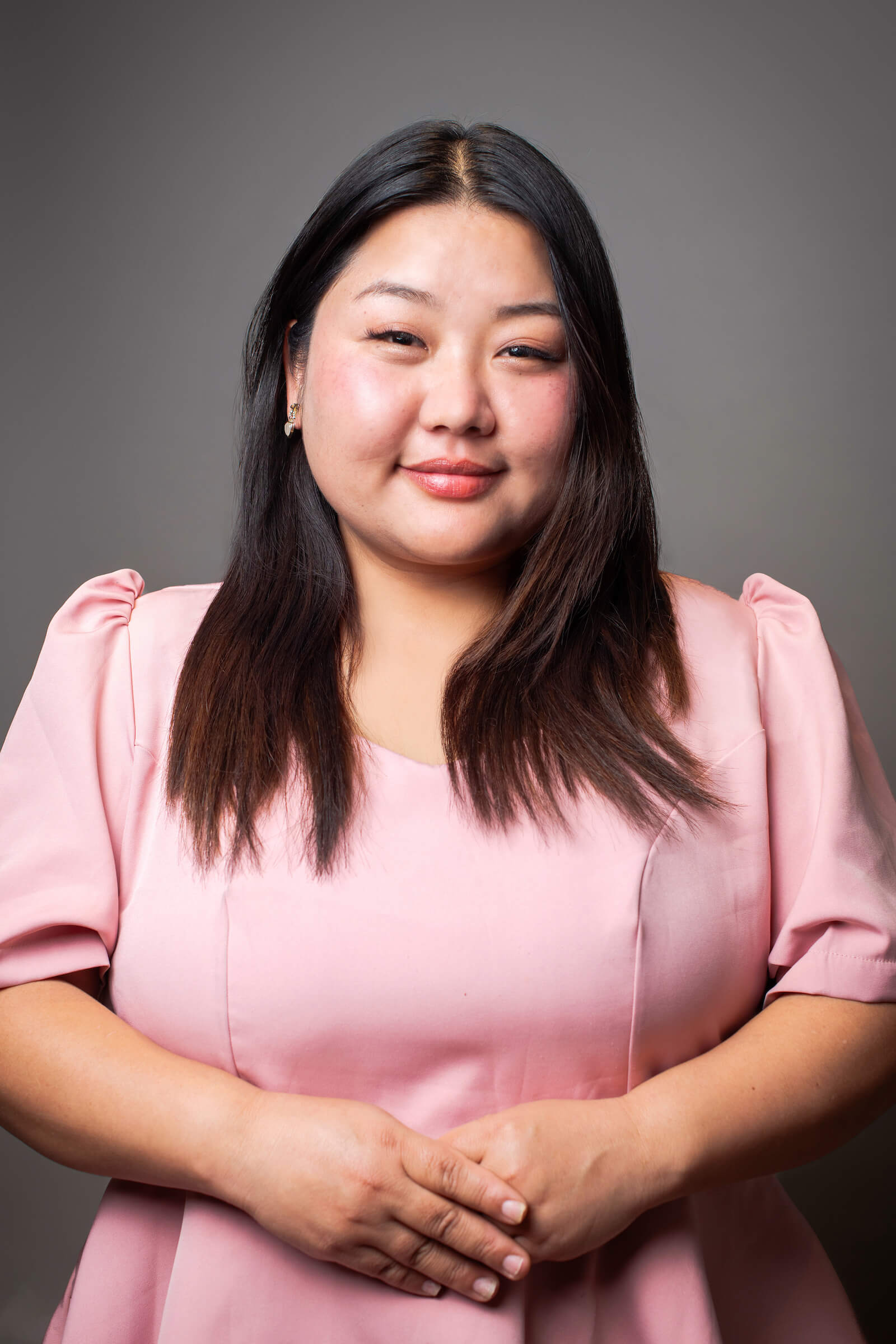 Professional headshot of a woman.