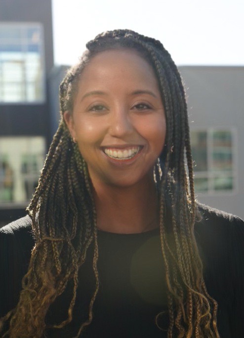 Woman posing for a headshot.