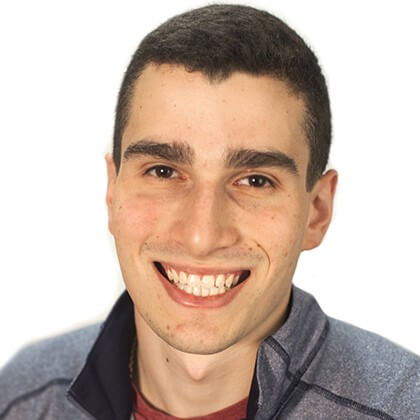 Man posing for a headshot.
