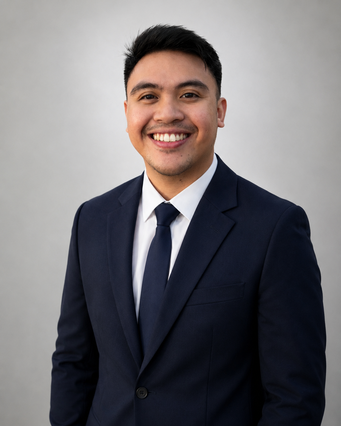 Man posing for a headshot.