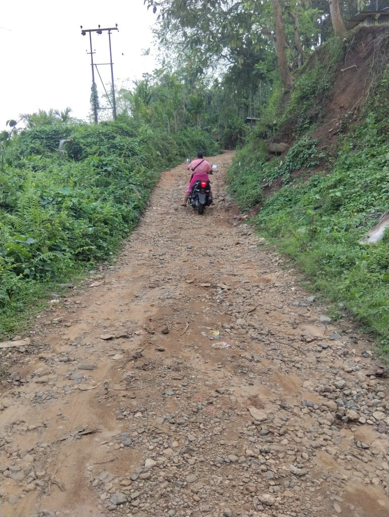 Getting Off my Scooty so my Colleague Could Ride Uphill