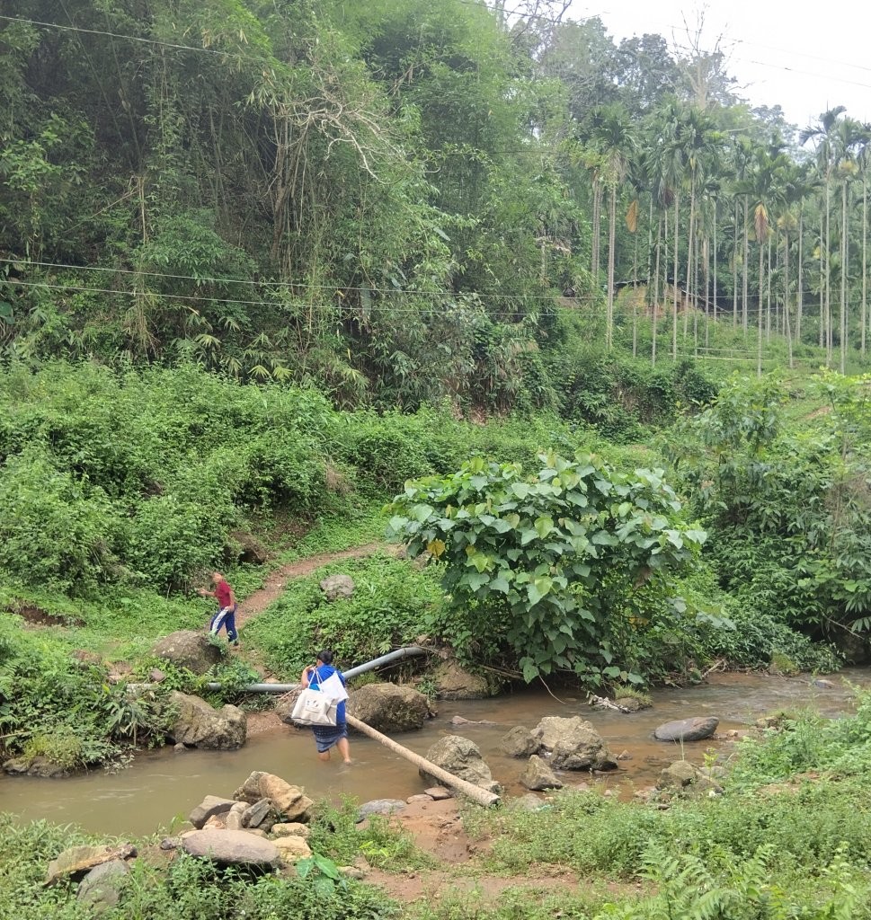 Crossing the Stream and Climbing the Hill for a Newborn Visit